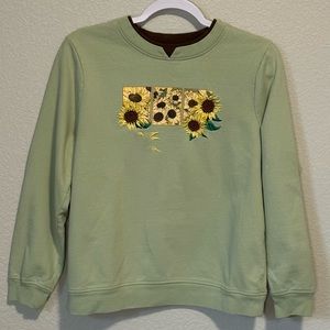 Light green sweatshirt with sunflower graphic and sunflower embroidery